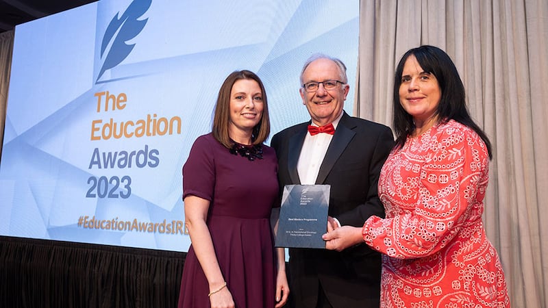 Dr Matt Cotterell, awards judge, presents the Best Masters Programme award to Prof. Joanne Lysaght and Prof. Jacintha O'Sullivan, Trinity College Dublin