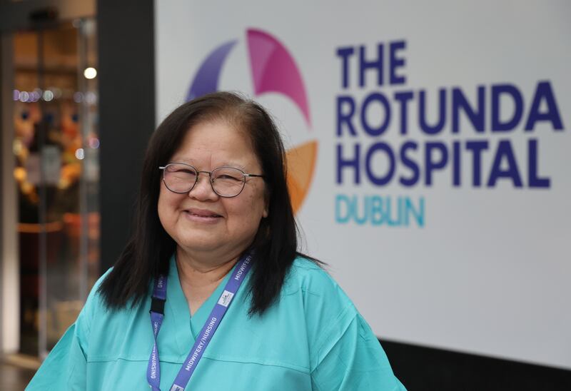 Every Christmas Yap Siew Hong sends a text to the mothers of babies that she has heled deliver. Yap has just retired from the Rotunda after working there for 20 years and working every Christmas.  Photograph: Nick Bradshaw for The Irish Times

