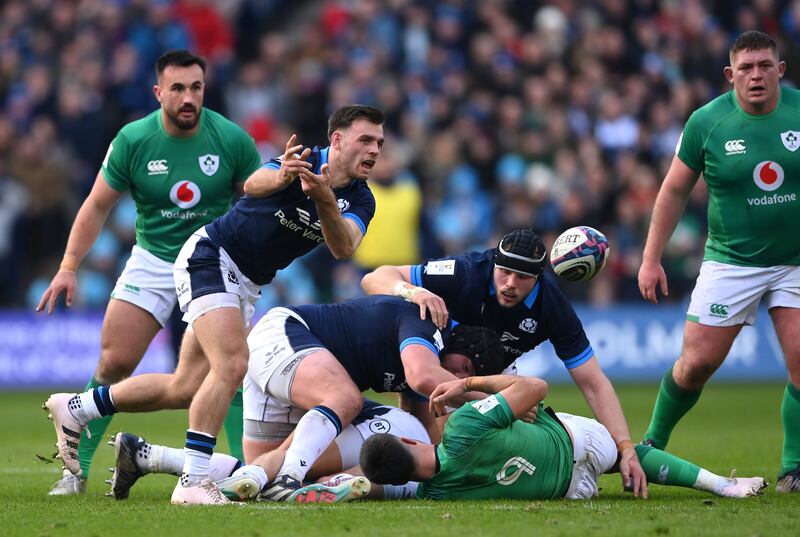 Ben White of Scotland passes the ball out of the ruck. Photograph: Stu Forster/Getty