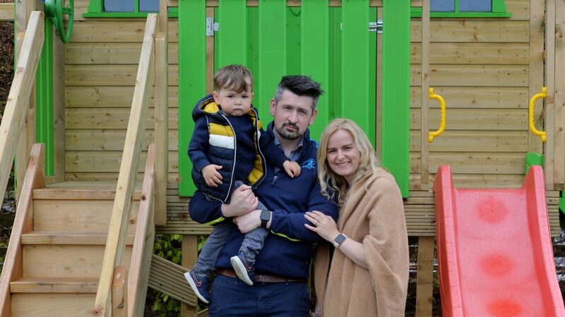 Selina and Justin Callaghan with their son Tristan (2).“Little Tristan helps a lot,” Selina says. “He keeps us busy.”  Photograph: Alan Betson/The Irish Times