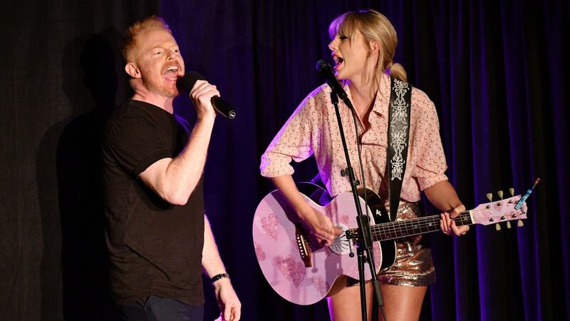 Jesse Tyler Ferguson and Taylor Swift perform at AEG and Stonewall Inns pride celebration commemorating the 50th anniversary of the Stonewall Uprising. Photograph:  Bryan Bedder/Getty Images for AEG