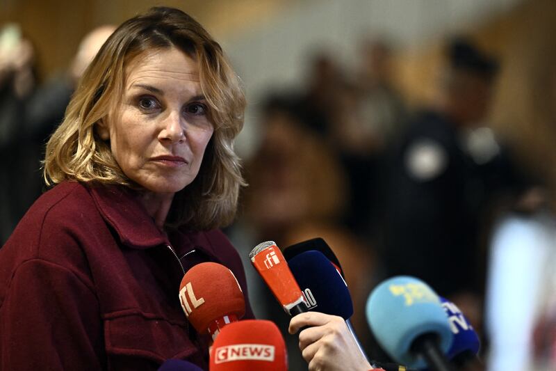 One of the plaintiffs, Amelie, answers journalists' questions after a hearing of the trial of French actor Gerard Depardieu Photograph: Getty 