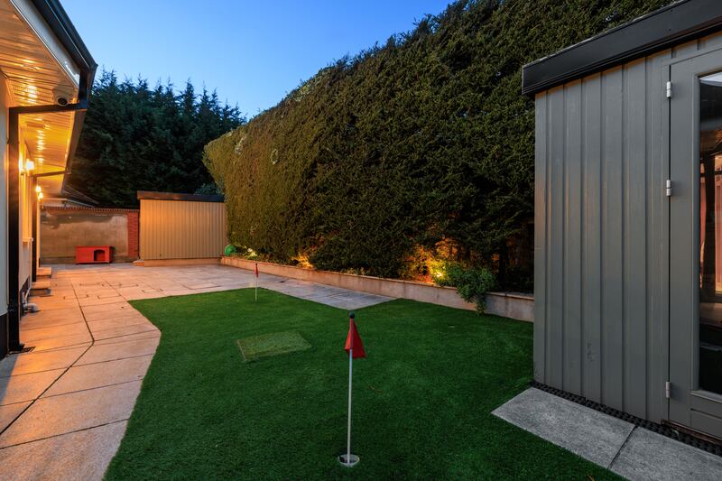 Though the gardens are not large, the house is within walking distance of the beach. Photograph: Andrew Nolan Photography