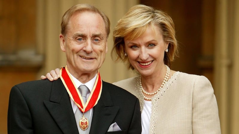 The late Harold Evans at Buckingham Palace in London with his wife, Tina Brown, after he was knighted by the Prince of Wales for service to journalism in 2004. Photograph: John Stillwell / PA Wire