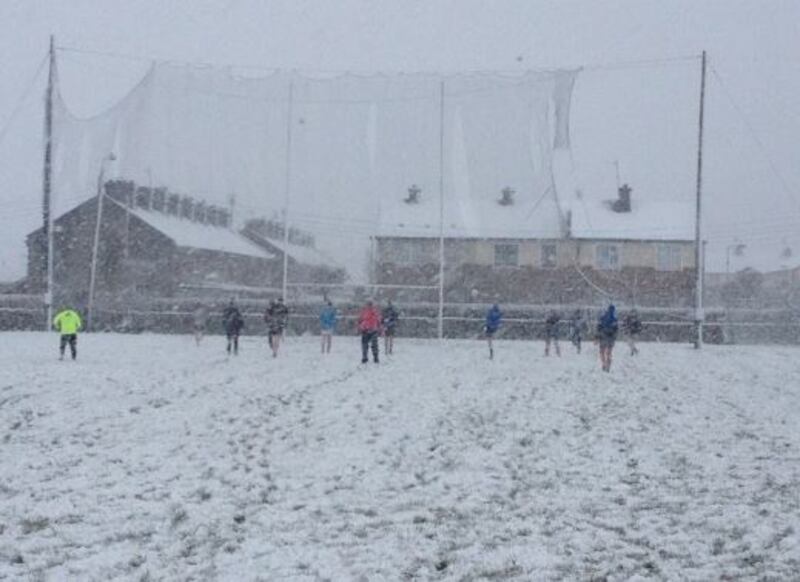 Arravale Rovers GAA Club members training in the snow.