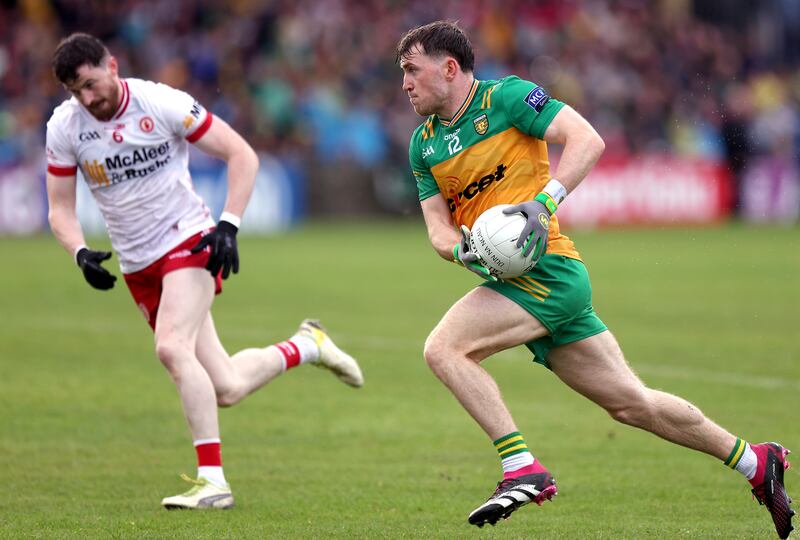 Donegal's Shane O'Donnell with Tyrone's Rory Brennan. Photograph: John McVitty/Inpho