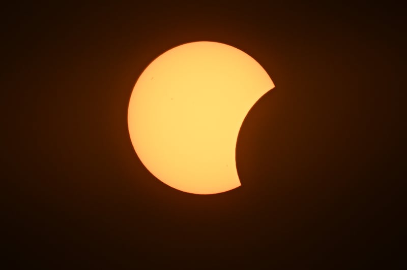 The early stage of the solar eclipse in Palencia, Spain. Photo by Leon Neal/Getty Images