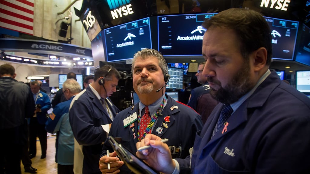 Traders on the floor of the New York Stock Exchange: Markets are pricing in a 56 per cent probability of the Fed raising rates in December. Photograph: Michael Nagle/ Bloomberg