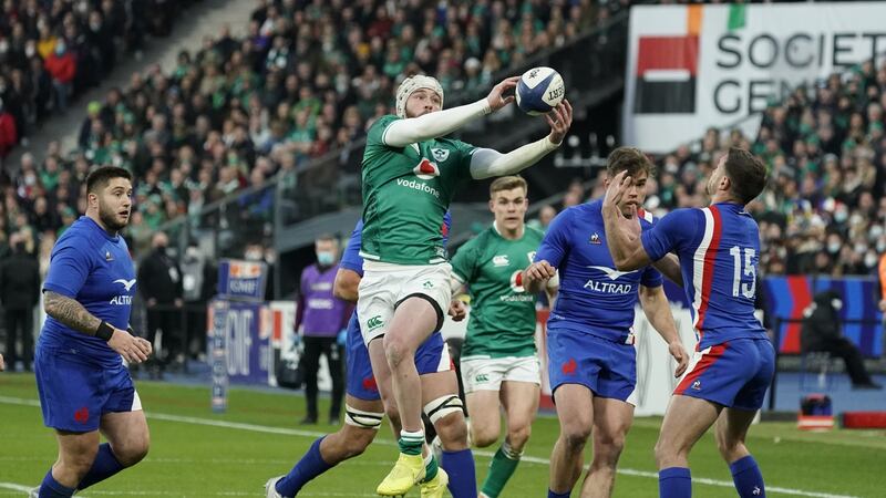 Mack Hansen chasing a ball down before going on to score Ireland’s first try against France at the Stade de France in 2022. Photograph: Dave Winter/Inpho