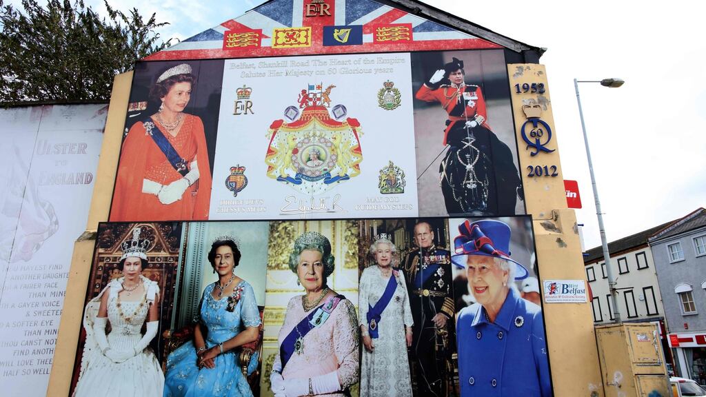 A building decorated with loyalist pictures of Britain’s Queen Elizabeth II on the Shankill Road in Belfast. Photograph:  Paul Faith/AFP