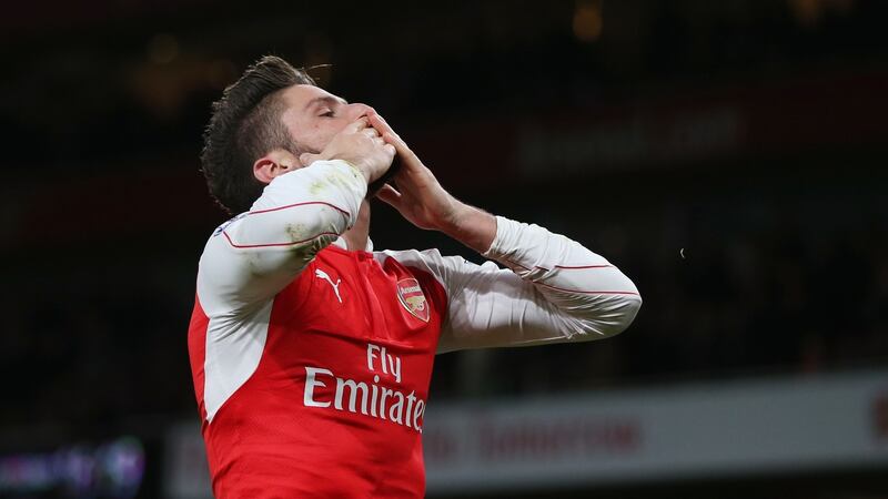 Olivier Giroud celebrates scoring at the right end for Arsenal. Photo: Alex Morton/Reuters