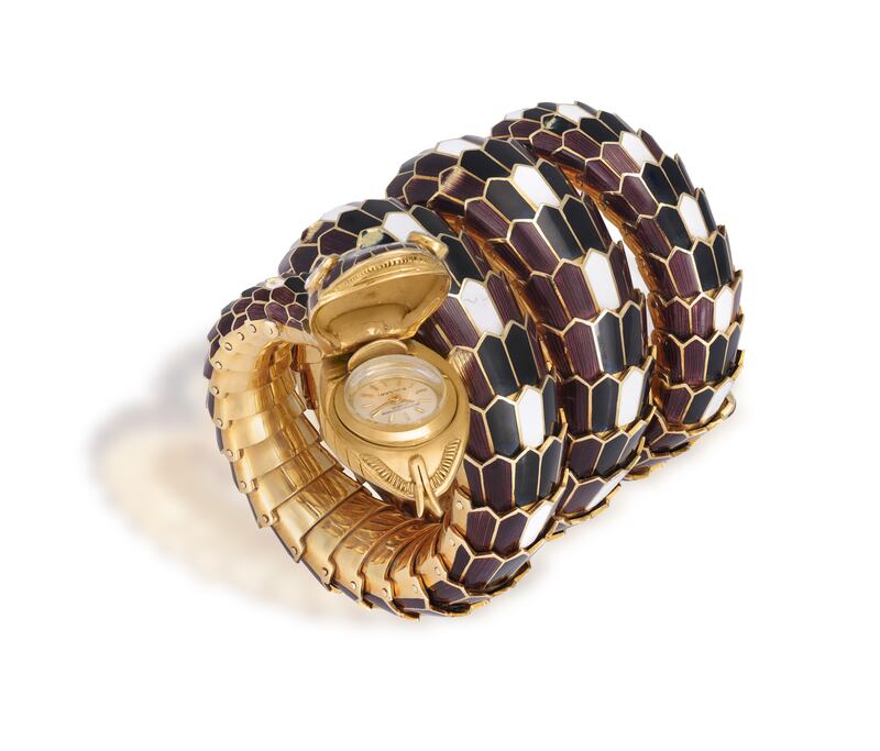 A rare enamel and diamond serpenti bracelet watch made by the Italian jewellery house Bulgari in 1960