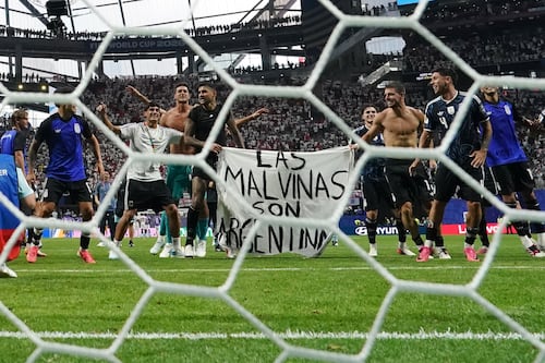What’s the story behind Argentina players holding up a banner about the Falkland Islands?