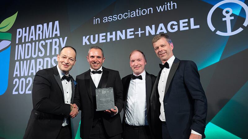 Victor Vargas, director commercial operations and strategic lead at QuickStat, a Kuehne+Nagel company, presents the sustainability initiative of the year to the Pfizer External Supply Ireland team