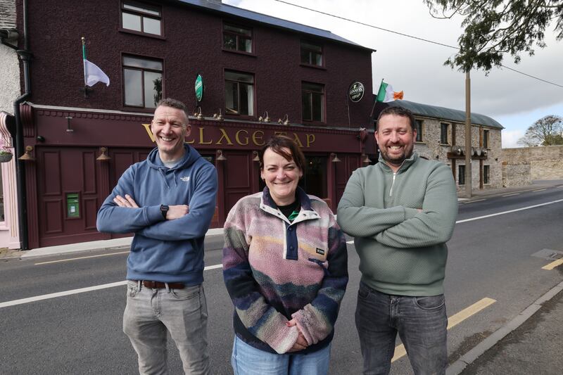 Owner Mark Dunne, manager Ruth Farrell and owner Wayne Walsh outside Village Tap in Rosenallis, Co Laois. Photograph: Alan Betson