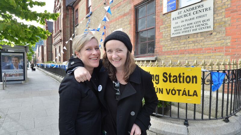 Una Mullally with her partner Sarah Francis voting in the marriage referendum. Photograph: Alan Betson