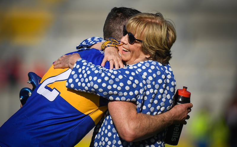 Cathal Barrett of Tipperary is congratulated by former Tipperary PRO Liz Howard following the Munster GAA Hurling Senior Championship Round 1 match between Cork and Tipperary. Photo: David Fitzgerald/Sportsfile