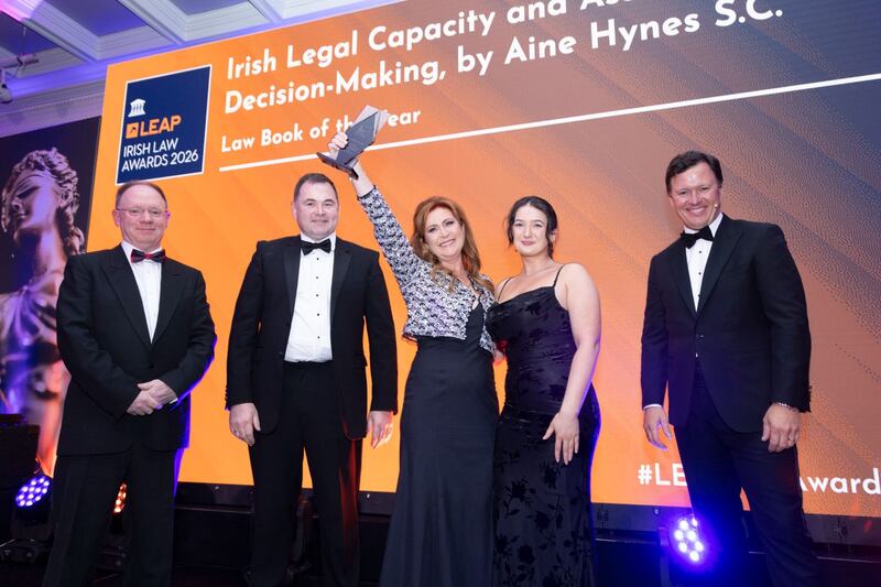 Richard Hammond, solicitor and partner at Hammond Good and chair of the judging panel of the Leap Irish Law Awards; Colm Moran, legal assistant at St John Solicitors; Áine Hynes, partner at St John Solicitors; Aoife de Staic, legal executive at St John Solicitors; and Anton Savage, MC of the night. Photograph: Paul Sherwood