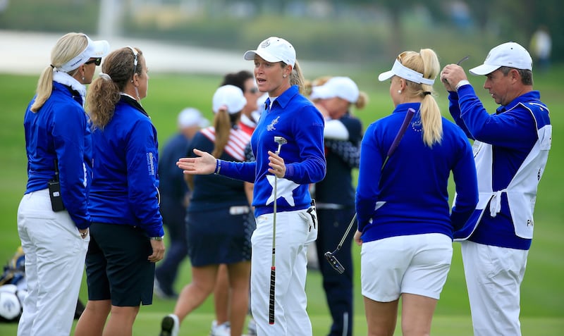 Suzann Pettersen tries to explain to her captain, Carin Koch, left, the length of putt that she did not concede to Alison Lee on the 17th green at the 2015 Solheim Cup. Photograph: David Cannon/Getty