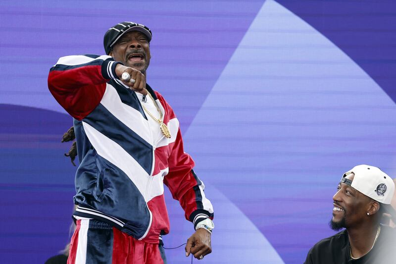 US rapper Snoop Dogg next to US basketball player Bam Adebayo during the women's breakdancing round robin at La Concorde in Paris. Photograph: Odd Andersen/AFP via Getty Images