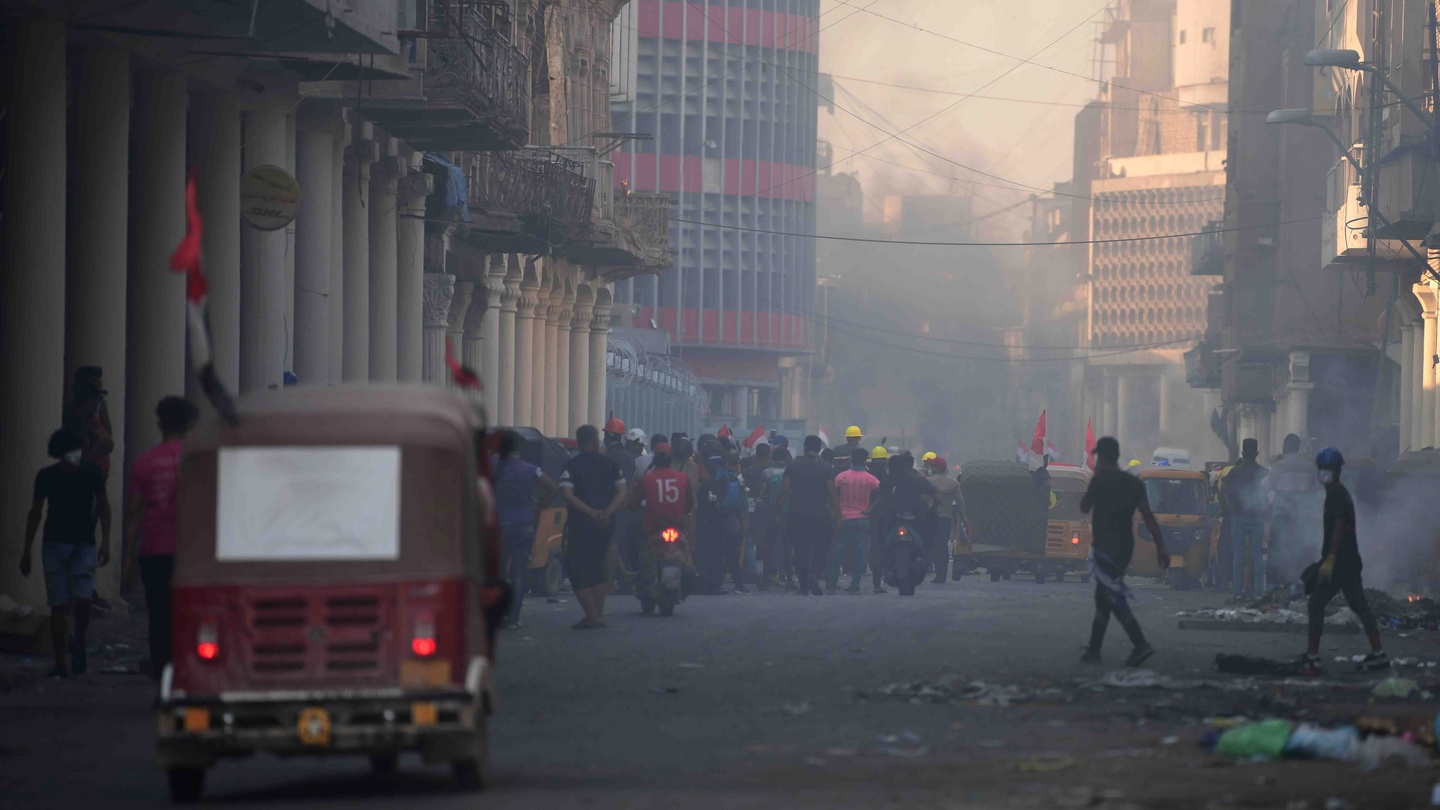 Demonstrators take part in an anti-government protest in Baghdad on Thursday. Photograph:  Murtaja Lateef/EPA