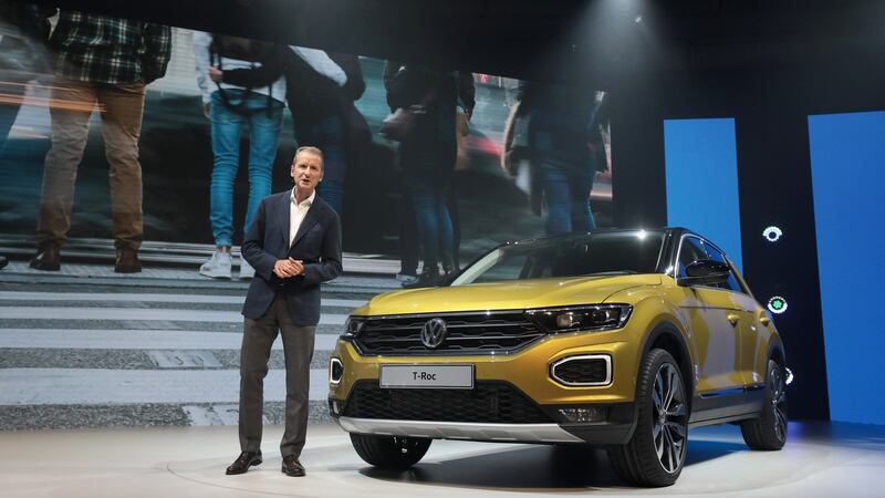 Herbert Diess, head of the Volkswagen AG (VW) brand, speaks next to a Volkswagen T-Roc. Photograph: Simon Dawson/Bloomberg