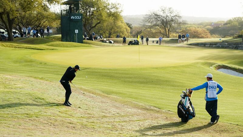Rory McIlroy  plays his shot on the fifth green during his match against Ian Poulter  during the first round of the WGC-Dell Technologies Match Play at Austin Country Club  in Texas. Photograph: Darren Carroll/Getty Images