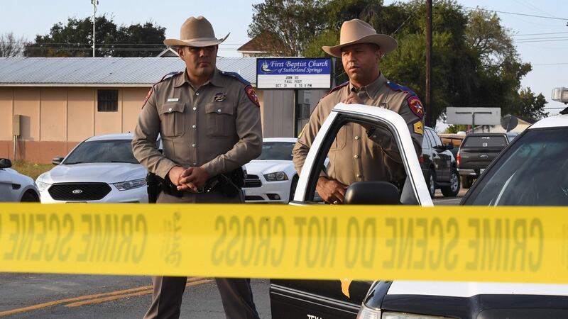 State troopers near the entrance to the First Baptist Church after a mass shooting that killed 26 people in Sutherland Springs, Texas. Photograph: Mark Ralston/AFP/Getty Images