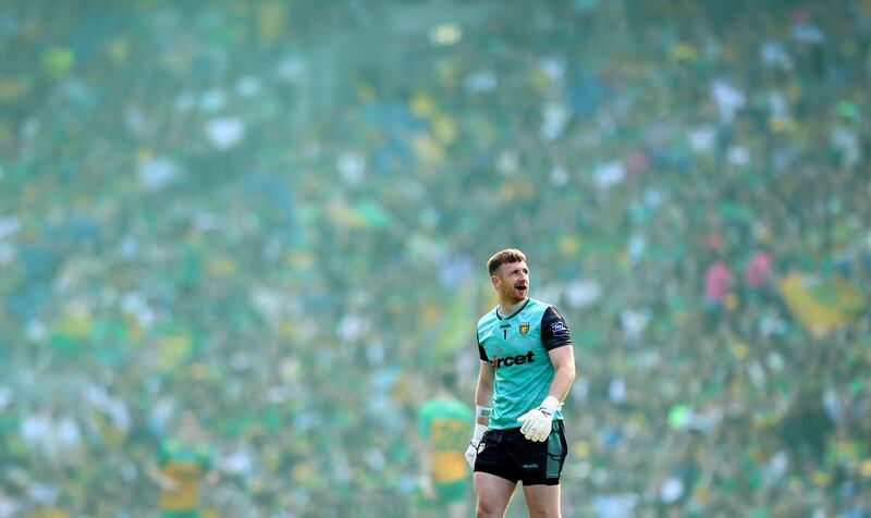 Donegal goalkeeper Shaun Patton looks on as smoke from a flare billows onto the pitch during Sunday's semi-final against Meath. Photograph: Ryan Byrne/Inpho