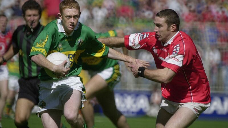 A young Colm Cooper brushes off a tackle from Cork’s Eoin Sexton at Croke Park. Photograph: Cyril Byrne