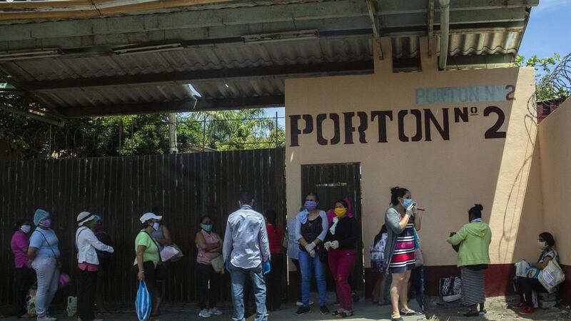 Relatives of coronavirus patients wait outside the German-Nicaraguan Hospital in Managua, Nicaragua on May 21st. Photograph: Inti Ocon/The New York Times