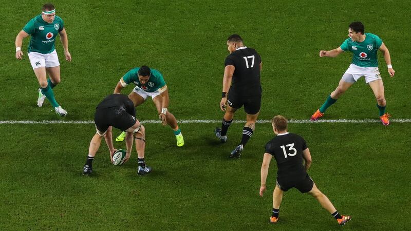 New Zealand’s Brodie Retallick knocks the ball on  to end the game. Photograph: Tommy Dickson/Inpho