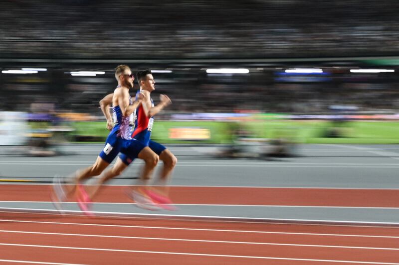 Jakob Ingebrigtsen and Josh Kerr on the final bend in the men's 1500m final during the World Athletics Championships. Photograph: Andrej Isakovic/AFP via Getty Images