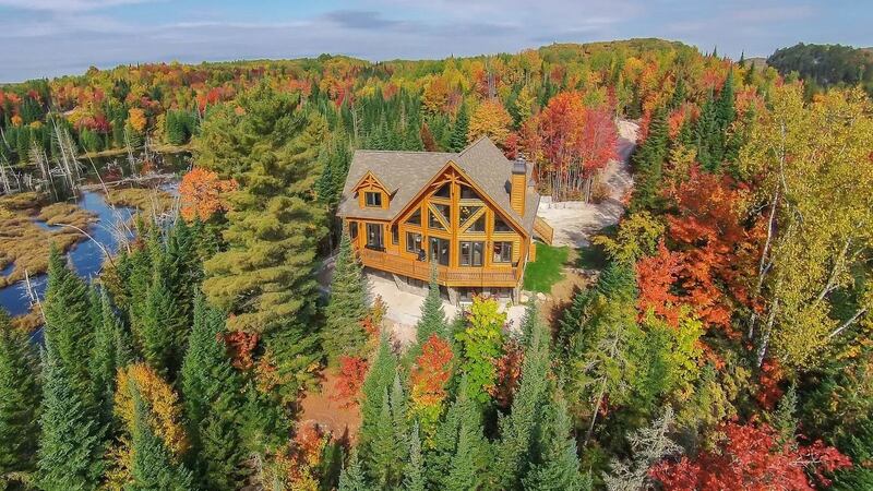 Quebec, Canada: Set in the idyllic spot of Amherst in the Laurentides, this five-bedroom wooden lodge  is the ultimate getaway.