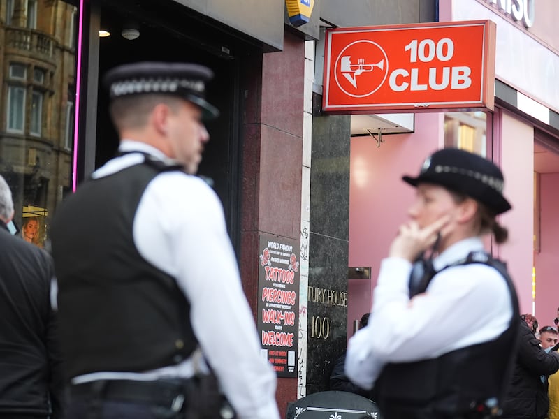 Police officers pictured outside the 100 Club in Oxford Street, central London, where Kneecap has announced a surprise gig for Thursday evening. Photograph: PA/ PA Wire