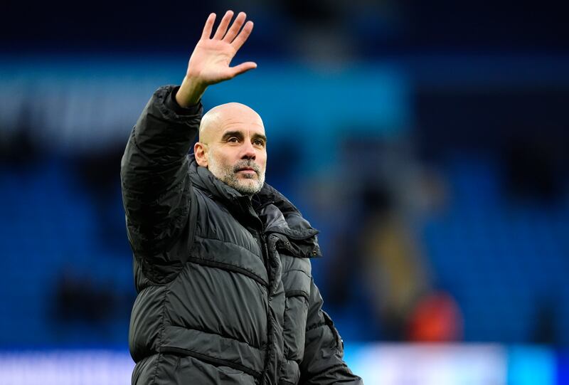 Manchester City manager Pep Guardiola acknowledges the fans following his team's 2-0 victory against Salford City in the FA Cup fourth round at the Etihad Stadium on Saturday. Photograph: Nick Potts/PA Wire