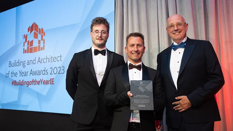 Stephen Pierce, Irish agent, 2tec2, presents the building of the year – tourism, leisure and hospitality award to Jan van Dijk and Declan Price, vanDijk Architects and Stoeger + Koelbl Architekten