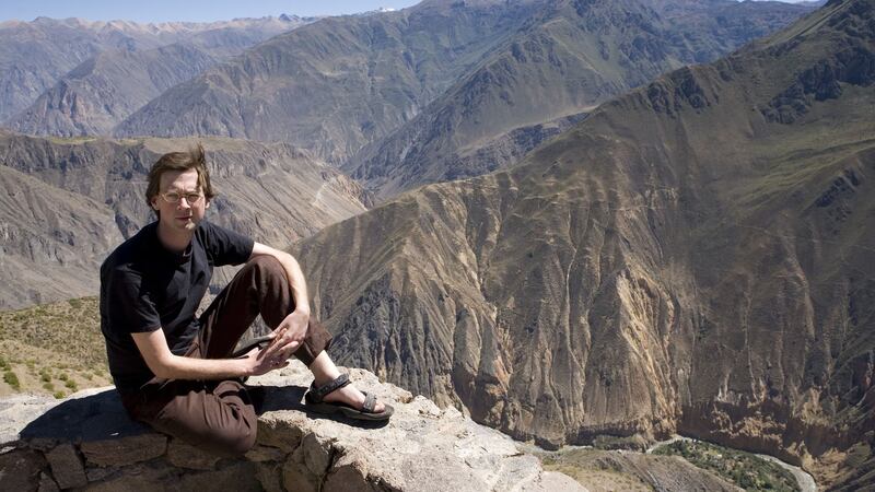 Manchán Magan overlooking the Colca Valley and Rio Colca in the central Andes, Arequipa Region, Peru. Photograph: Karoki Lewis