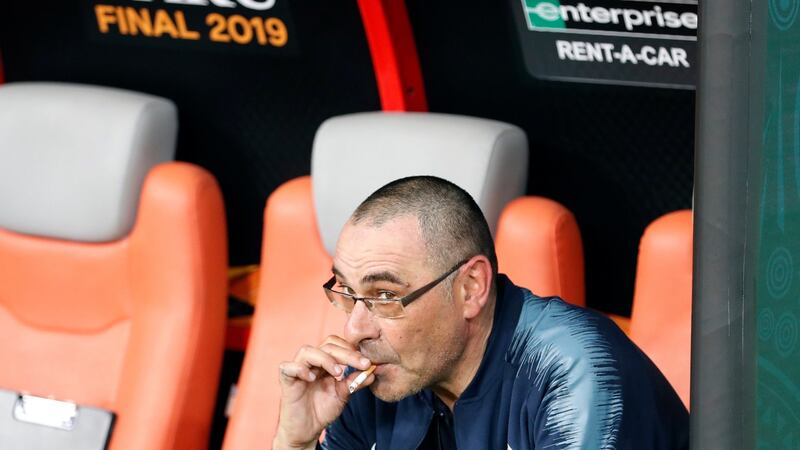Maurizio Sarri has a cigarette after Chelsea’s Europa League final win in Baku. Photograph: Darko Bandic/AP