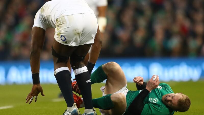 Keith Earls following his collision with  England’s Maro. Photograph: James Crombie/Inpho