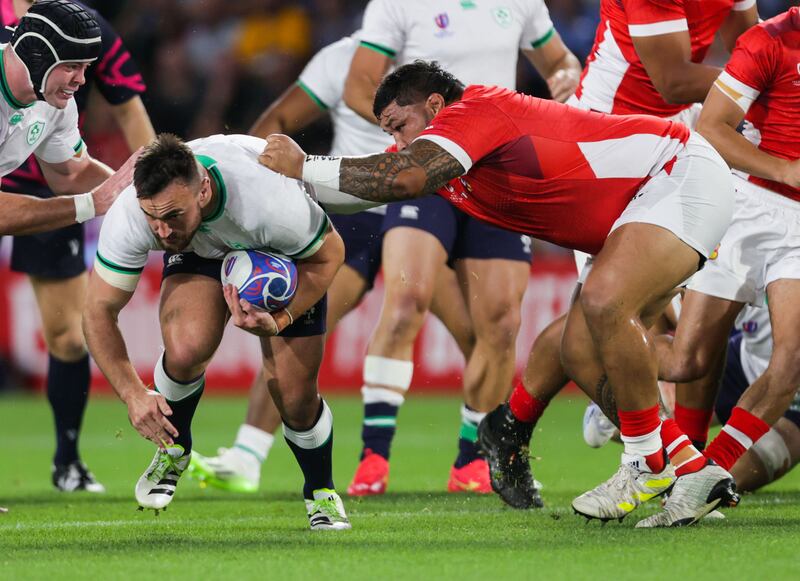 Ireland’s Ronan Kelleher is tackled by Ben Tameifuna of Tonga. Photograph: Laszlo Geczo/Inpho