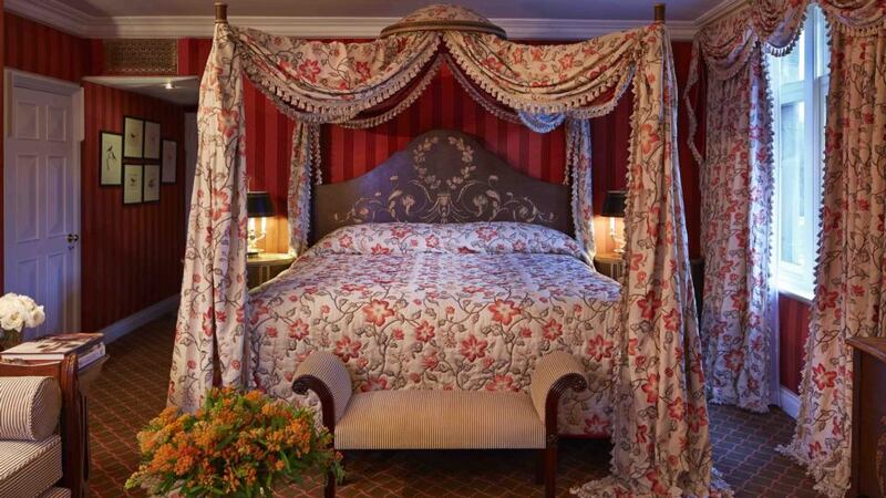 A renovated lake view deluxe room at Ashford Castle, which reopens on March 14th