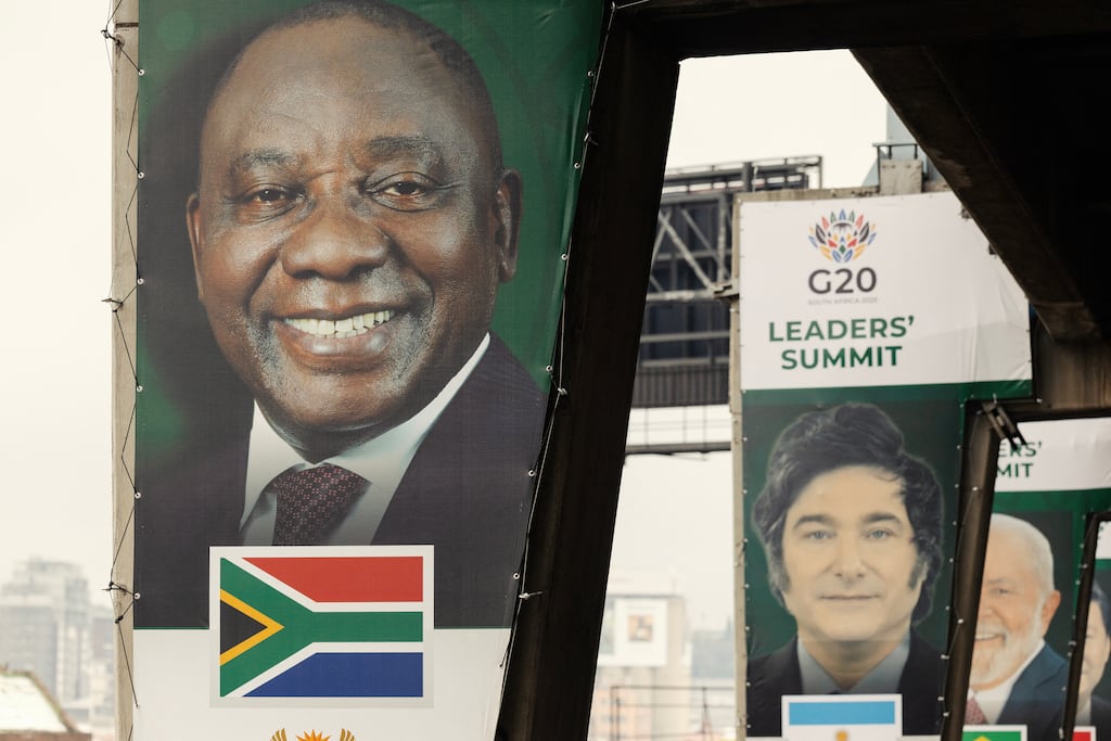 A banner showing South African president Cyril Ramaphosa (left), who is also the president of the G20 for 2025, is displayed on a pillar in Johannesburg ahead of this weekend's summit. Photograph: Gianluigi Guercia/AFP via Getty Images