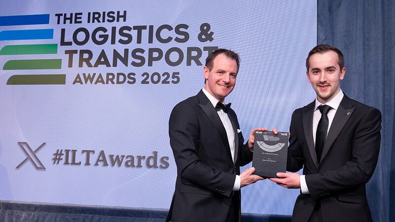Seamus Kavanagh, awards judge, presents the 3PL achievement award to Jurica Knezevic, Road Truck Services.