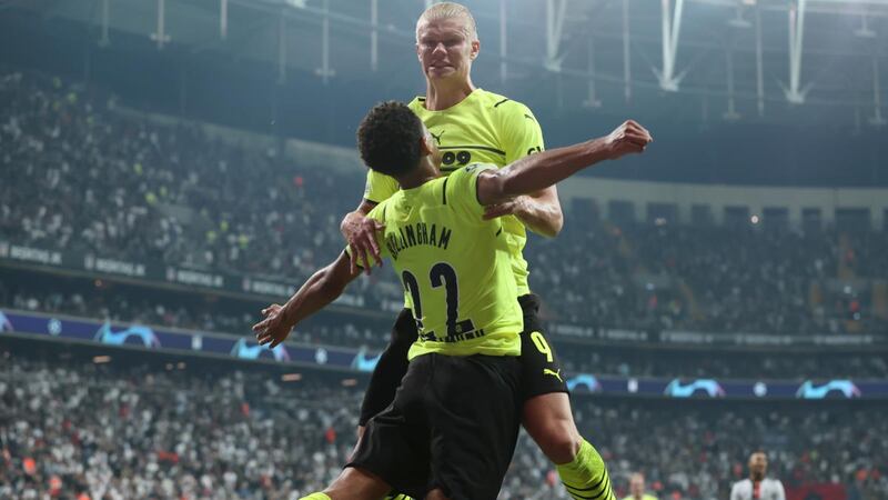 Erling Haaland  celebrates with of Borussia Dortmund team-mate Jude Bellingham after scoring their  second goal during the  Champions League Group C match against  Besiktas  at Vodafone Park  in Istanbul, Turkey. Photograph: Alex Grimm/Getty Images