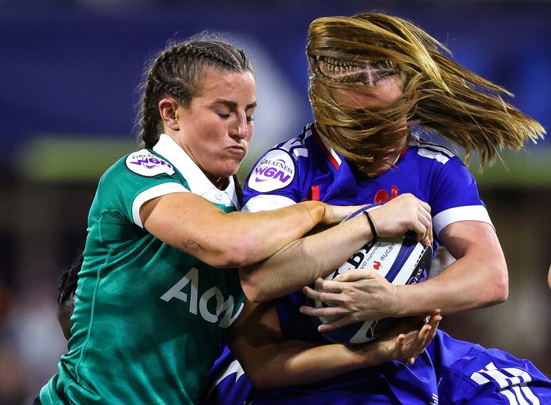Ireland's Emily Lane tackles France’s Pauline Bourdon Sansus. Photograph: Inpho