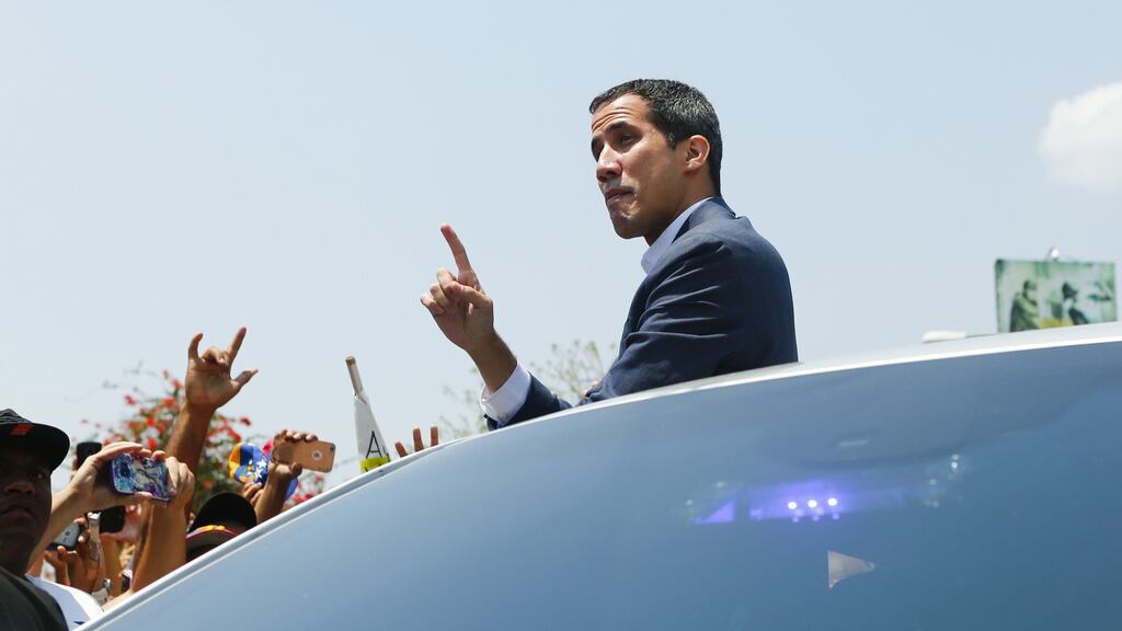 Opposition leader and self-proclaimed interim president of Venezuela Juan Guaidó said the opposition-controlled national assembly would organise freedom committees in every street to mobilise supporters to descend on the Miraflores palace in Caracas. Photograph: Eva Marie Uzcategui/Getty