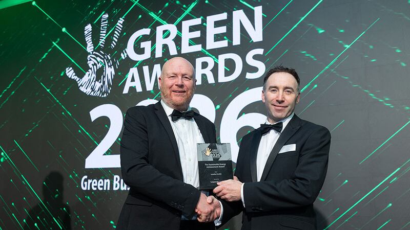 Owen Power, chief executive at Greenvolt Next, presents the sustainable energy achievement award to Brian Sorohan, Astellas Dublin