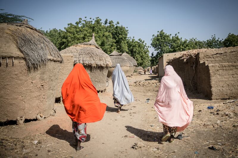 Children walk through a village in southern Niger. Photograph: Sally Hayden