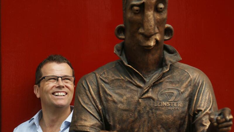 Paul Howard and the Ross O’Carroll-Kelly statue in Dublin city centre. Photograph: Nick Bradshaw